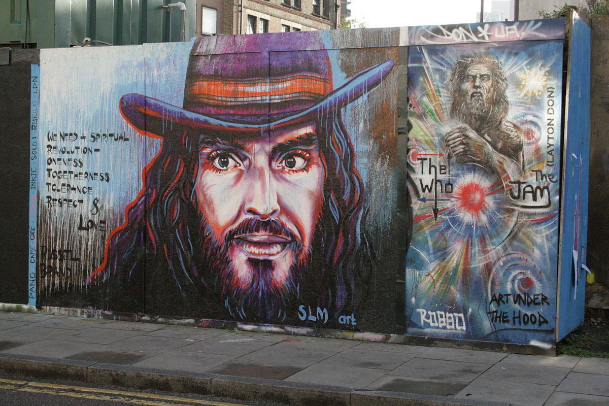 Street art by unknown artist on Hackney Street, London. For my 5 reasons why people so dislike Russell Brand, please read on...