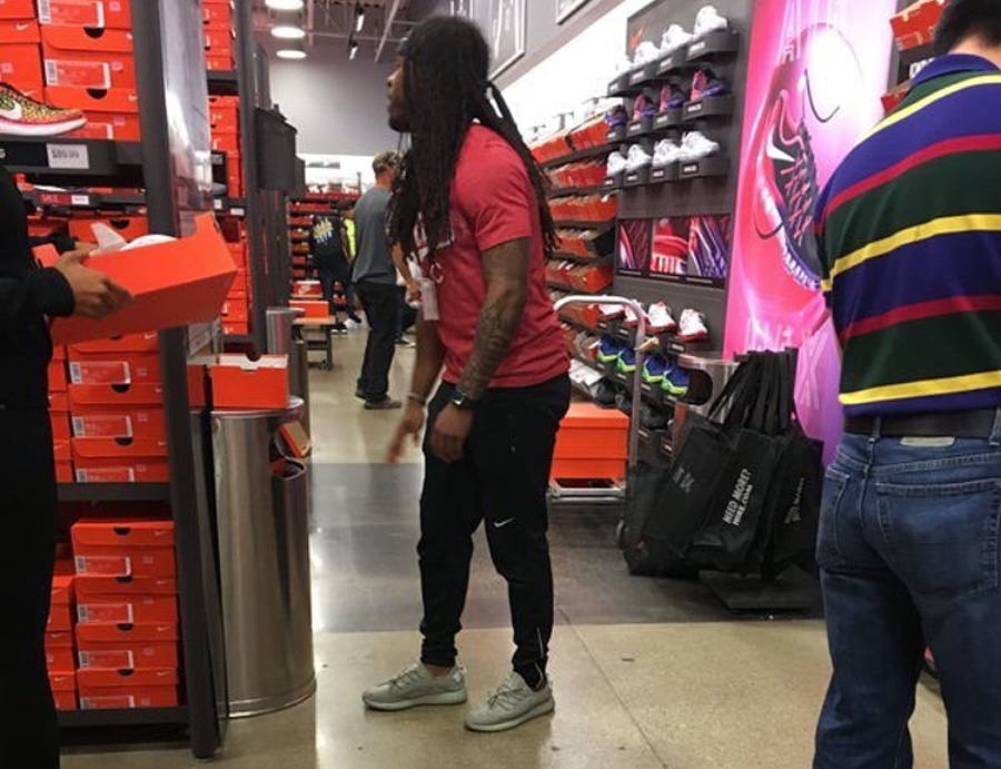 Savage Nike Employee Wears Yeezy Boosts 