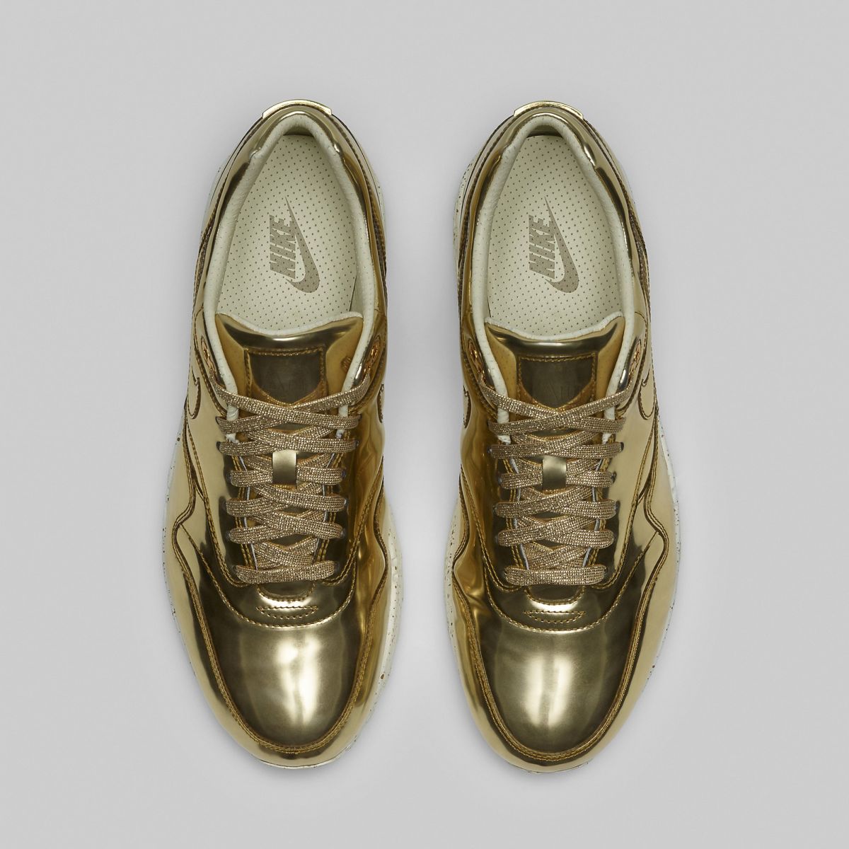 gold nike shoes mens