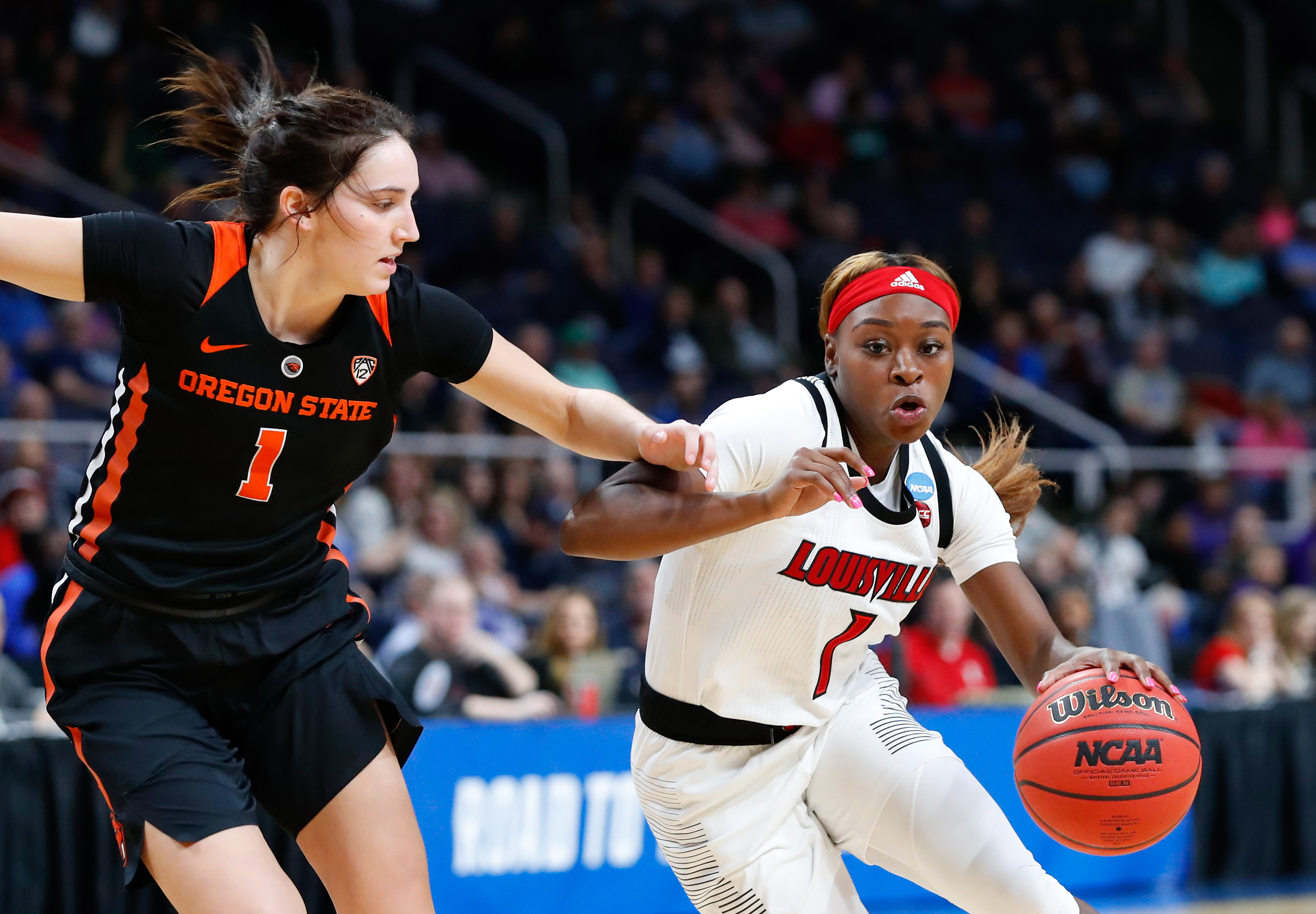 Louisville's Dana Evans surpasses 1,000 career points