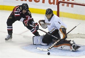 Jonas Hiller makes 39 saves, Ducks defeat Senators 2-1 in shootout