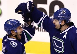 Canucks riding high but GM Mike Gillis wants to guard against any sudden fall
