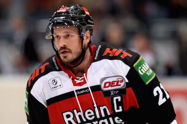 Ads on jerseys? Glowing pucks? Have ye no shame, NHL? cover image