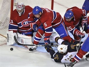 Byfuglien scores in overtime to give Thrashers 4-3 victory over Canadiens