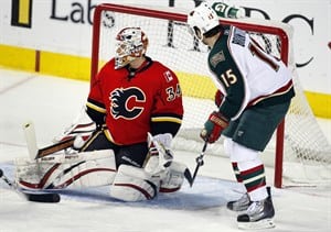Flames goaltender Miikka Kiprusoff tries to work his way out of slump