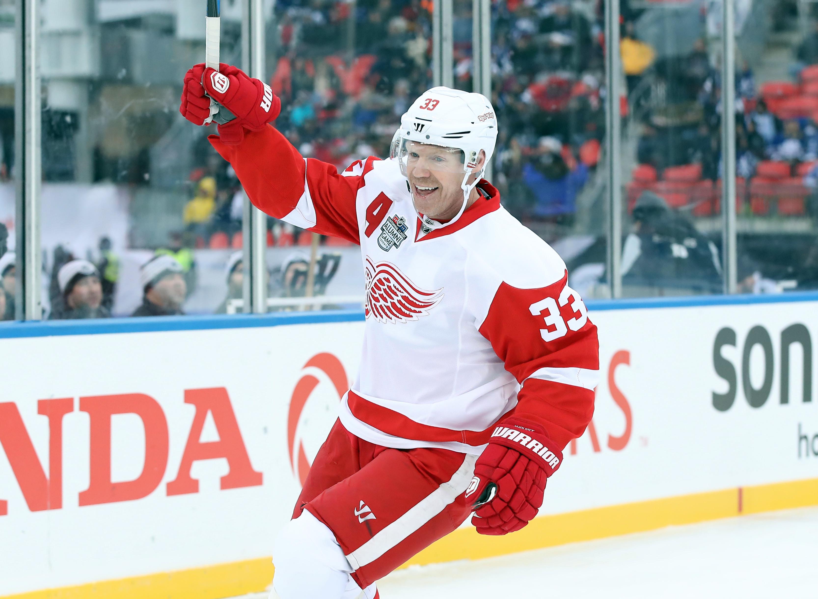 Dec 31, 2016; Toronto, ON, Canada; Detroit Red Wings forward Kris Draper (33) celebrates as he scores the game-winning goal late in the third period against the Toronto Maple Leafs during the 2017 Rogers NHL Centennial Classic Alumni Game at BMO Field. The Red Wings beat the Maple Leafs 4-3. Mandatory Credit: Tom Szczerbowski-USA TODAY Sports - Newly Promoted Kris Draper: "It’s incredible how fortunate I’ve been to be a part of this organization for 30 years.”