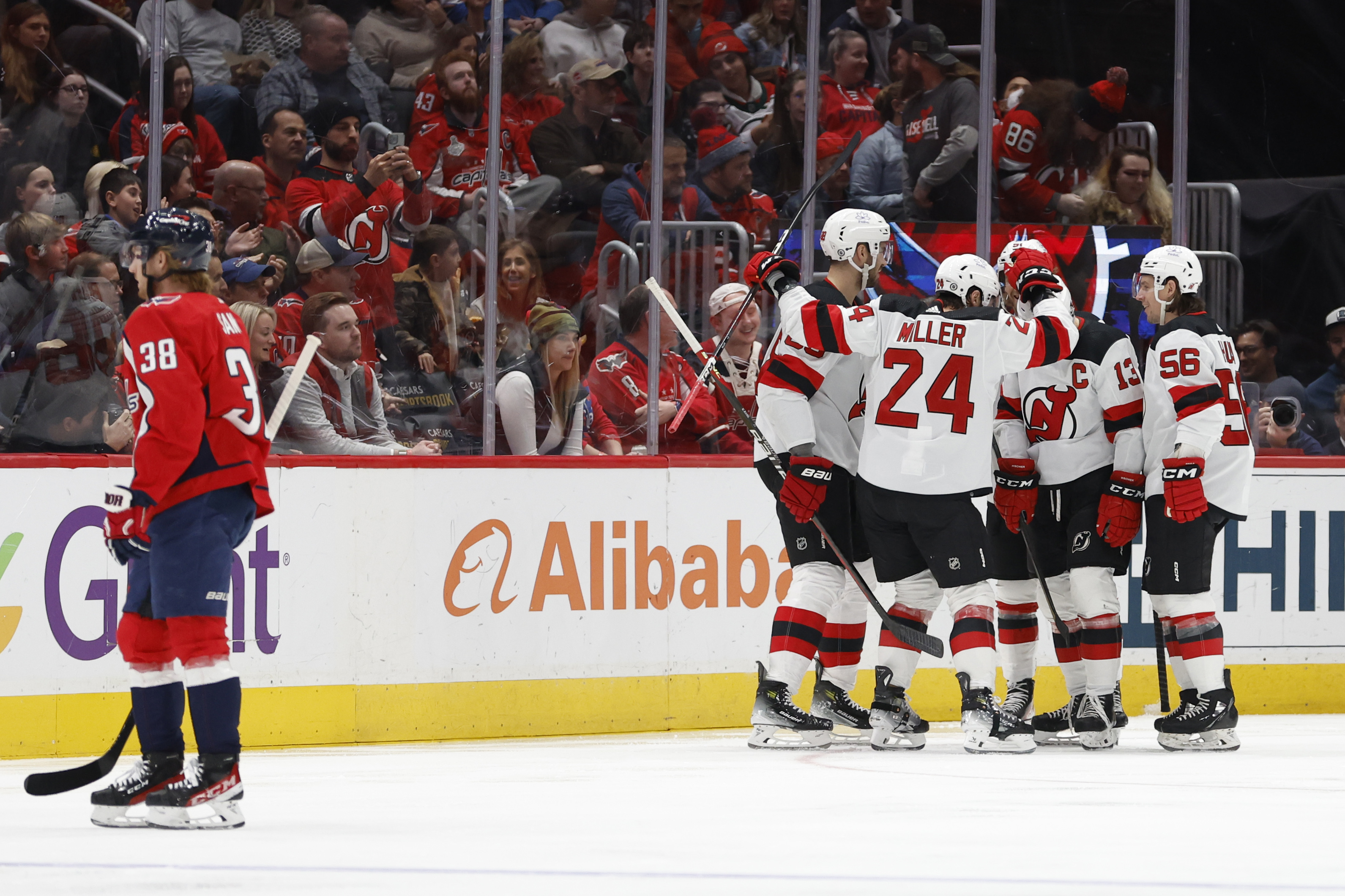 Jan 3, 2024; Washington, District of Columbia, USA; New Jersey Devils center Nico Hischier (13) celebrates with teammates after scoring a goal against the Washington Capitals in the first period at Capital One Arena. Mandatory Credit: Geoff Burke-USA TODAY Sports - Gameday Preview: Devils @ Capitals