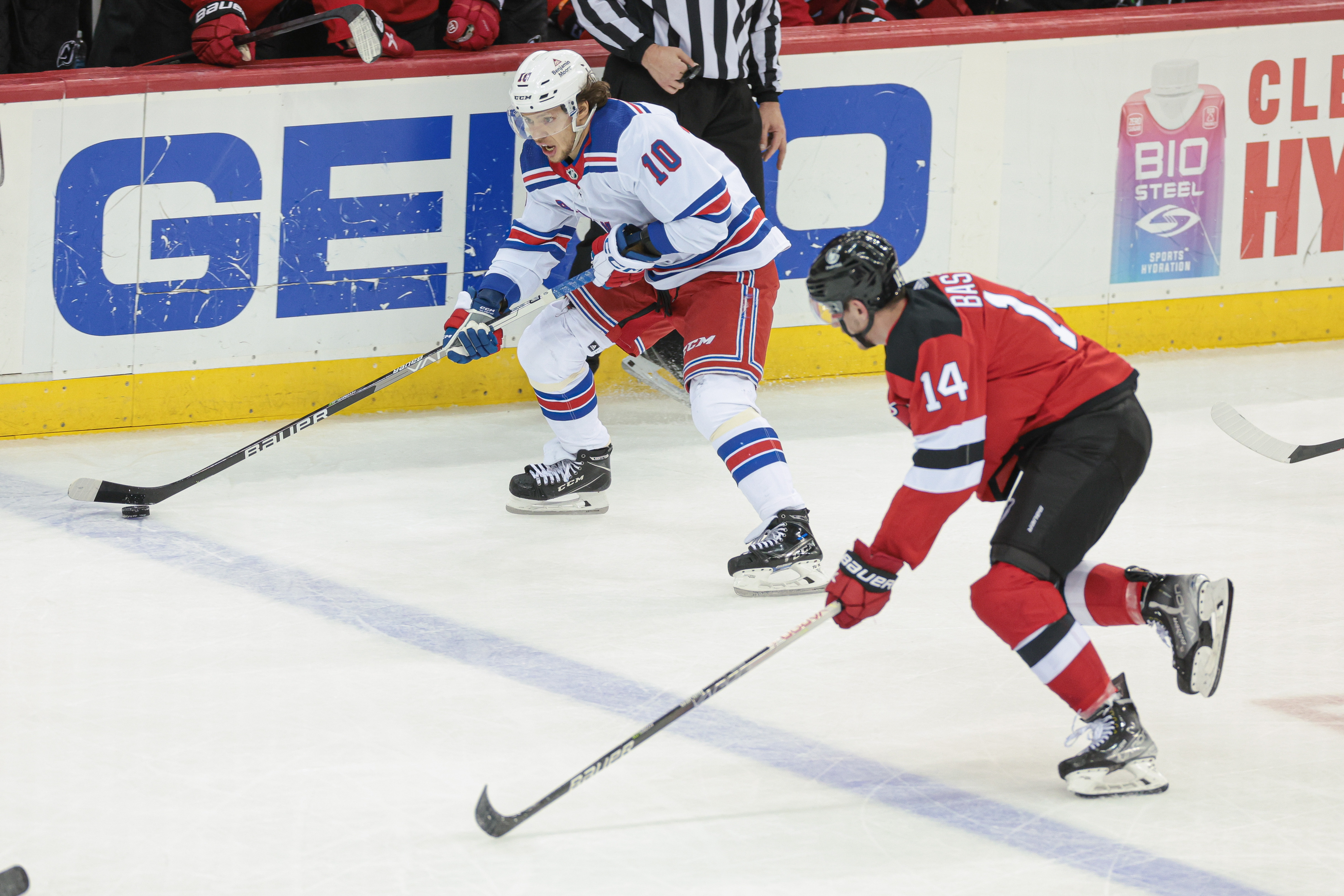 May 1, 2023; Newark, New Jersey, USA; New York Rangers left wing Artemi Panarin (10) skates with the puck asNew Jersey Devils right wing Nathan Bastian (14) defends during the third period in game seven of the first round of the 2023 Stanley Cup Playoffs at Prudential Center. Mandatory Credit: Vincent Carchietta-USA TODAY Sports - REPORT: NHL Player Safety Will Not Hold Hearing for Hit on Devils’ Nathan Bastian