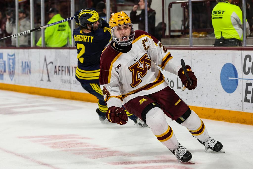 Photo by Matt Krohn - Minnesota's Jaxon Nelson signs with the Boston Bruins