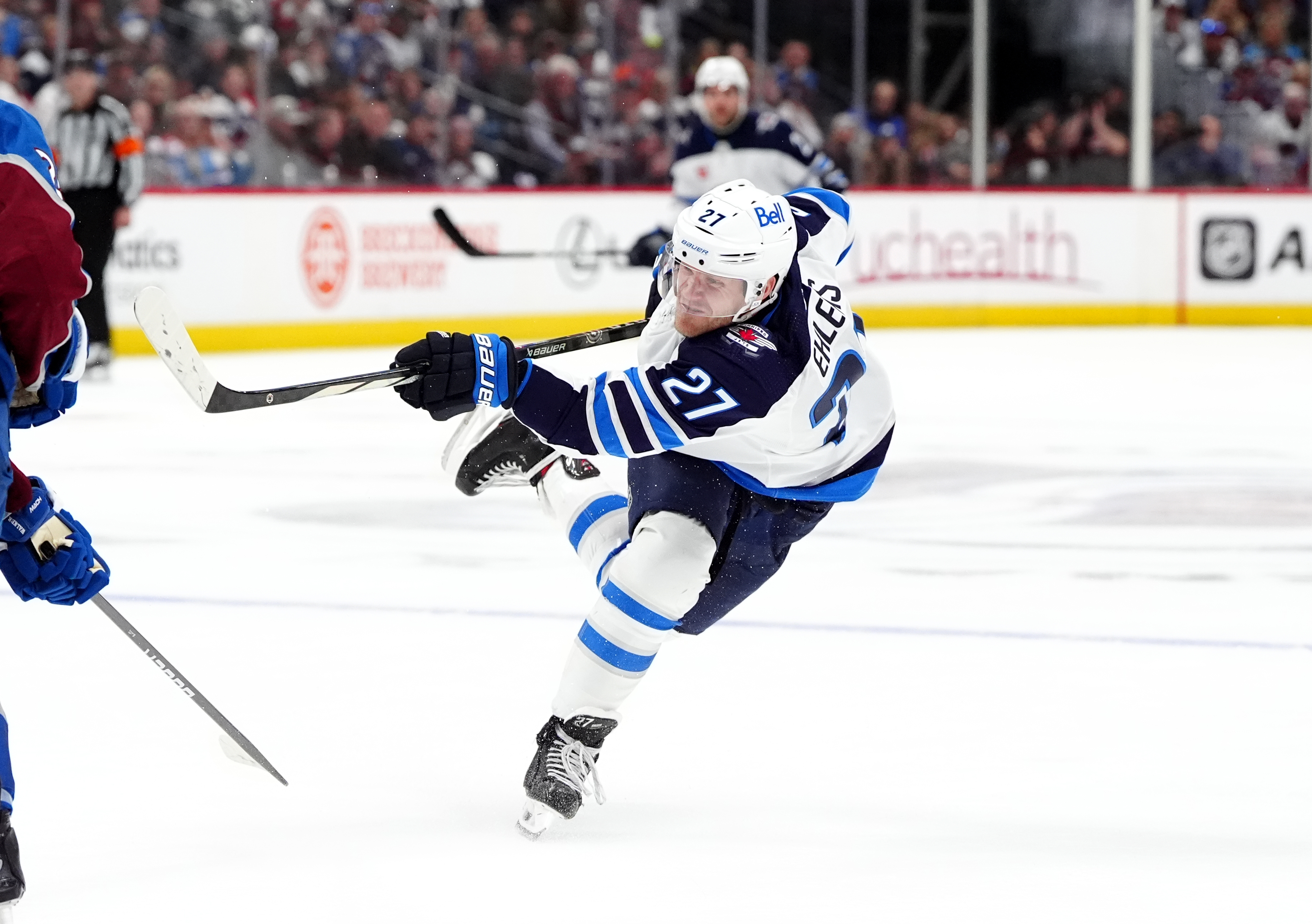 Apr 28, 2024; Denver, Colorado, USA; Winnipeg Jets left wing Nikolaj Ehlers (27) takes a shot on goal during the third period against the Colorado Avalanche in game four of the first round of the 2024 Stanley Cup Playoffs at Ball Arena. Mandatory Credit: Ron Chenoy-USA TODAY Sports - Trade Talk: Would a Jakob Chychrun-For-Nikolaj Ehlers Deal Make Sense for the Ottawa Senators?