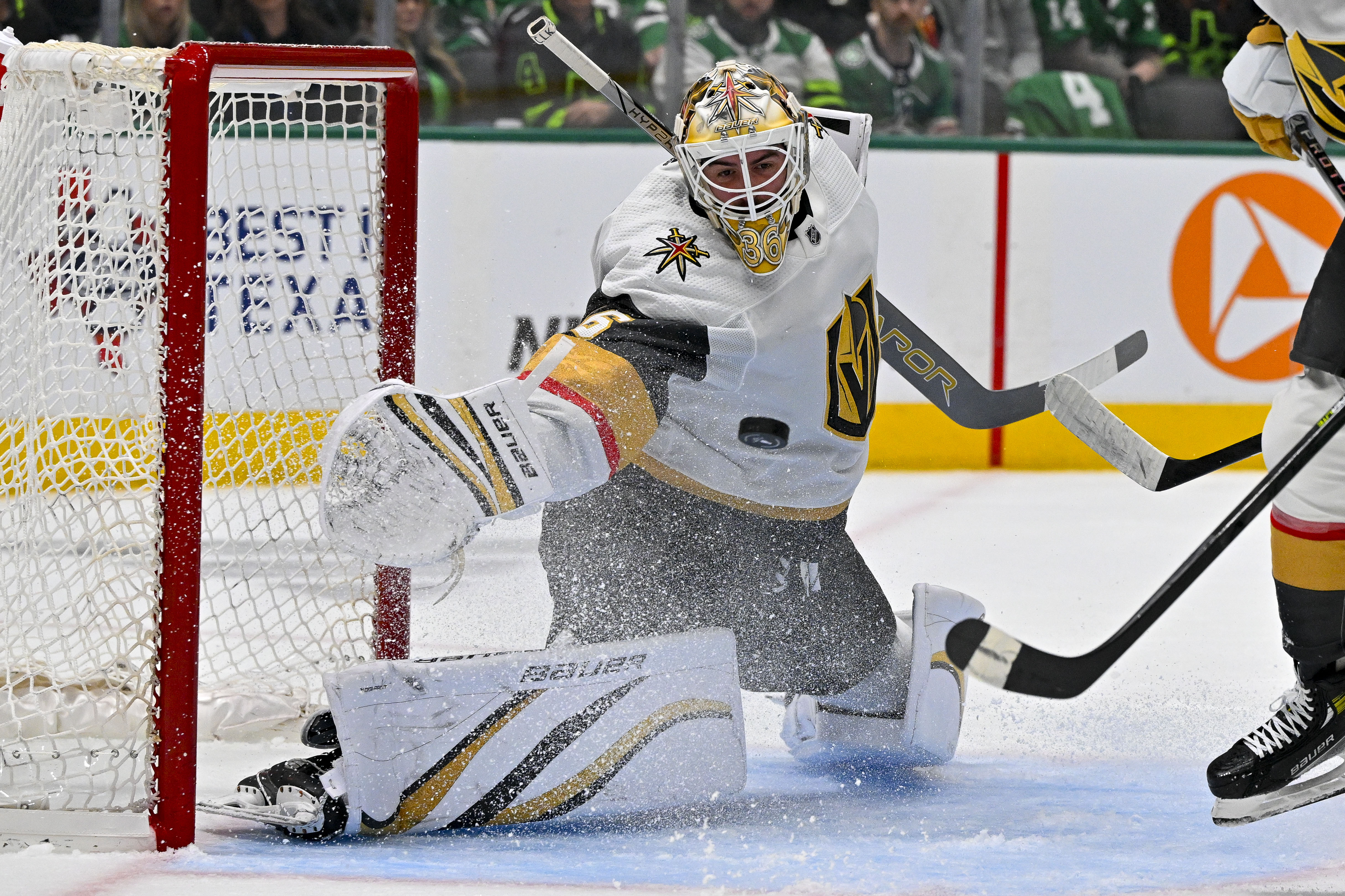 Apr 22, 2024; Dallas, Texas, USA; Vegas Golden Knights goaltender Logan Thompson (36) makes a glove save on a Dallas Stars shot during the second period in game one of the first round of the 2024 Stanley Cup Playoffs at the American Airlines Center. Mandatory Credit: Jerome Miron-USA TODAY Sports - Devils’ Fitzgerald Should Pursue 2025 UFA Logan Thompson