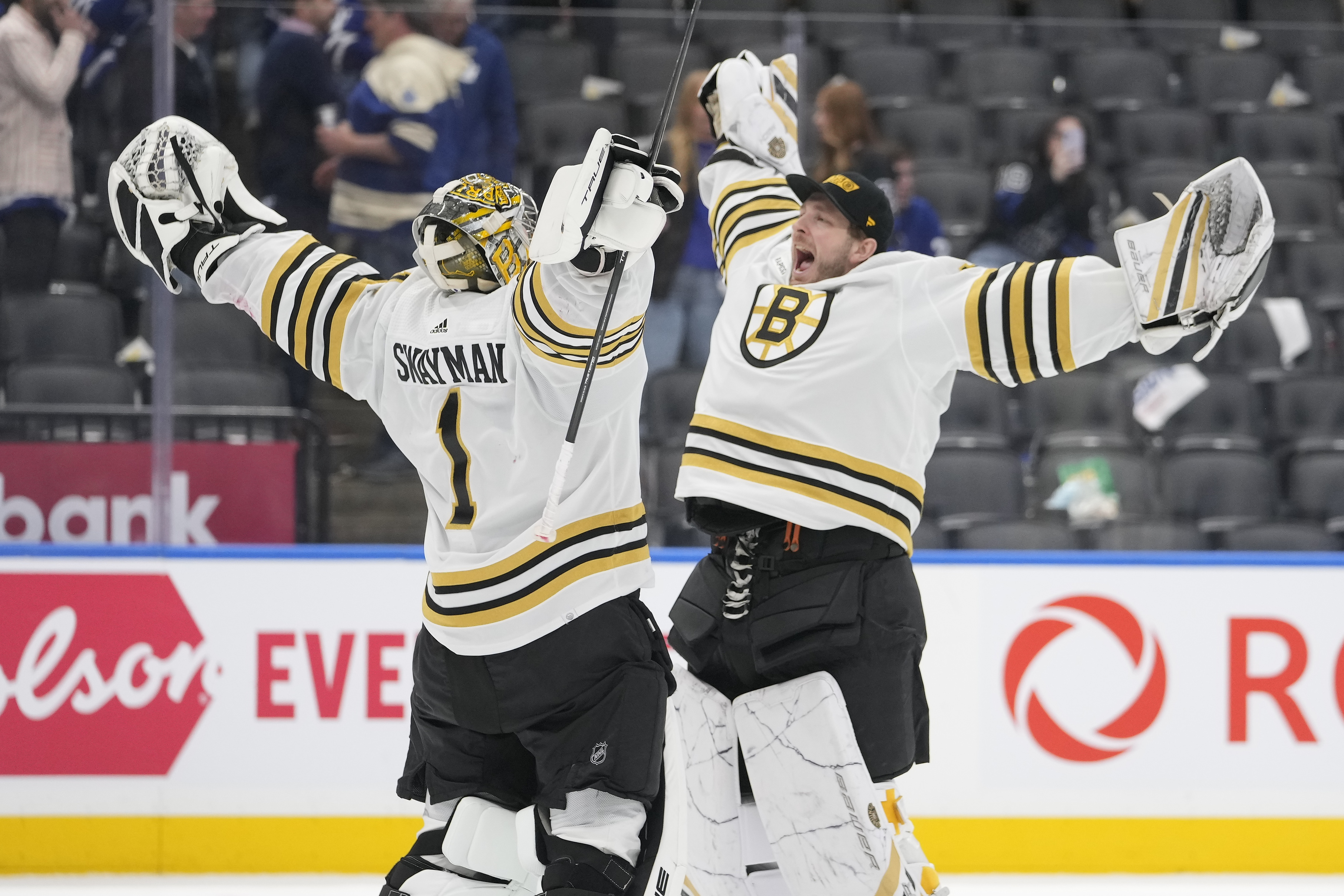 Apr 24, 2024; Toronto, Ontario, CAN; Boston Bruins goaltender Linus Ullmark (right) congratulates goaltender Jeremy Swayman (1) on a win over the Toronto Maple Leafs in game three of the first round of the 2024 Stanley Cup Playoffs at Scotiabank Arena. Mandatory Credit: John E. Sokolowski-USA TODAY Sports - Ottawa Senators Acquire Linus Ullmark, Swapping Goalies with the Boston Bruins
