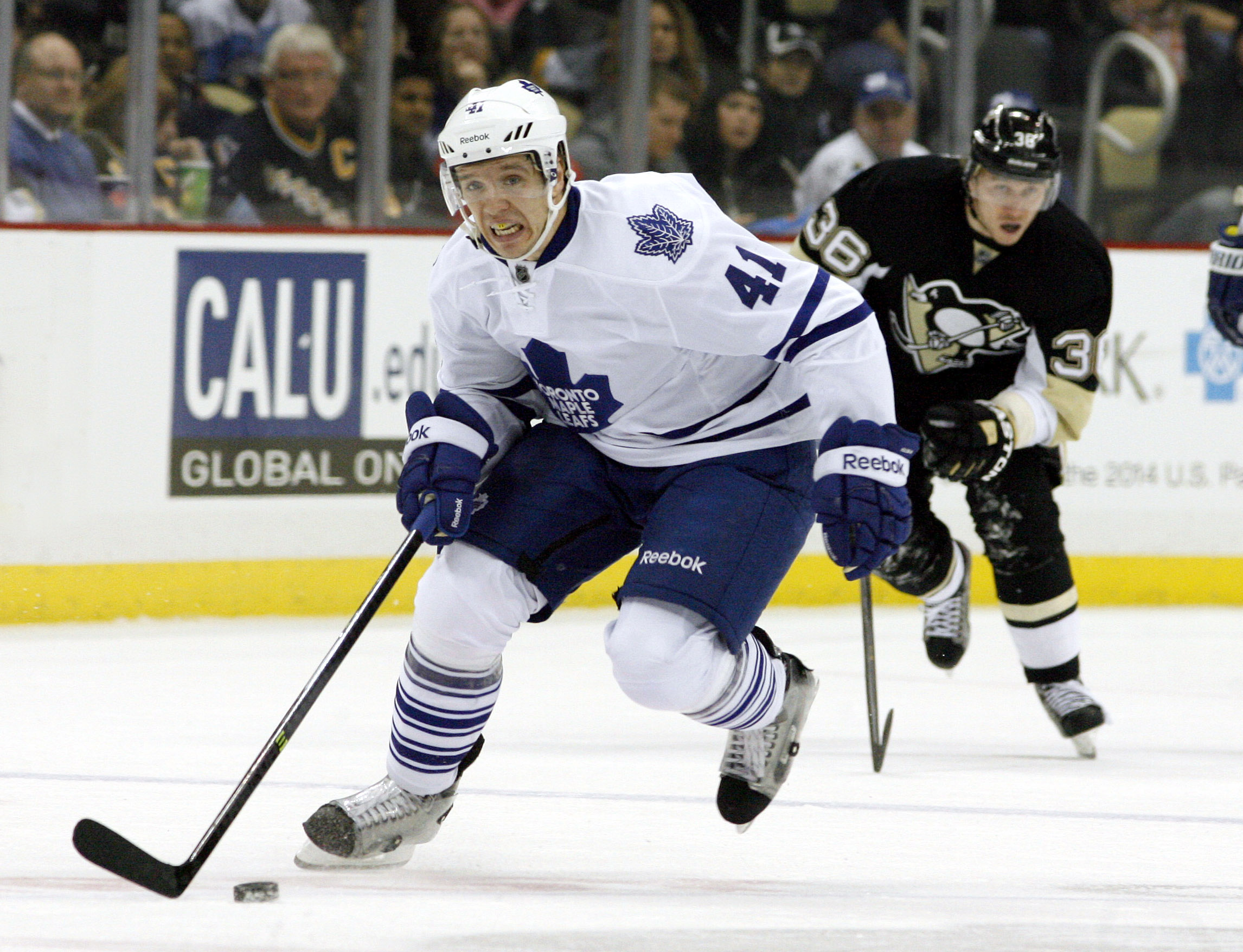 Nov 27, 2013; Pittsburgh, PA, USA; Toronto Maple Leafs left wing Nikolai Kulemin (41) breaks up ice with the puck against the Pittsburgh Penguins during the third period at the CONSOL Energy Center. The Penguins won 6-5 in a shootout. Mandatory Credit: Charles LeClaire-Imagn Images - More Job Cuts in the Capital: Ottawa Senators Release Former Toronto Maple Leaf 30-Goal Scorer
