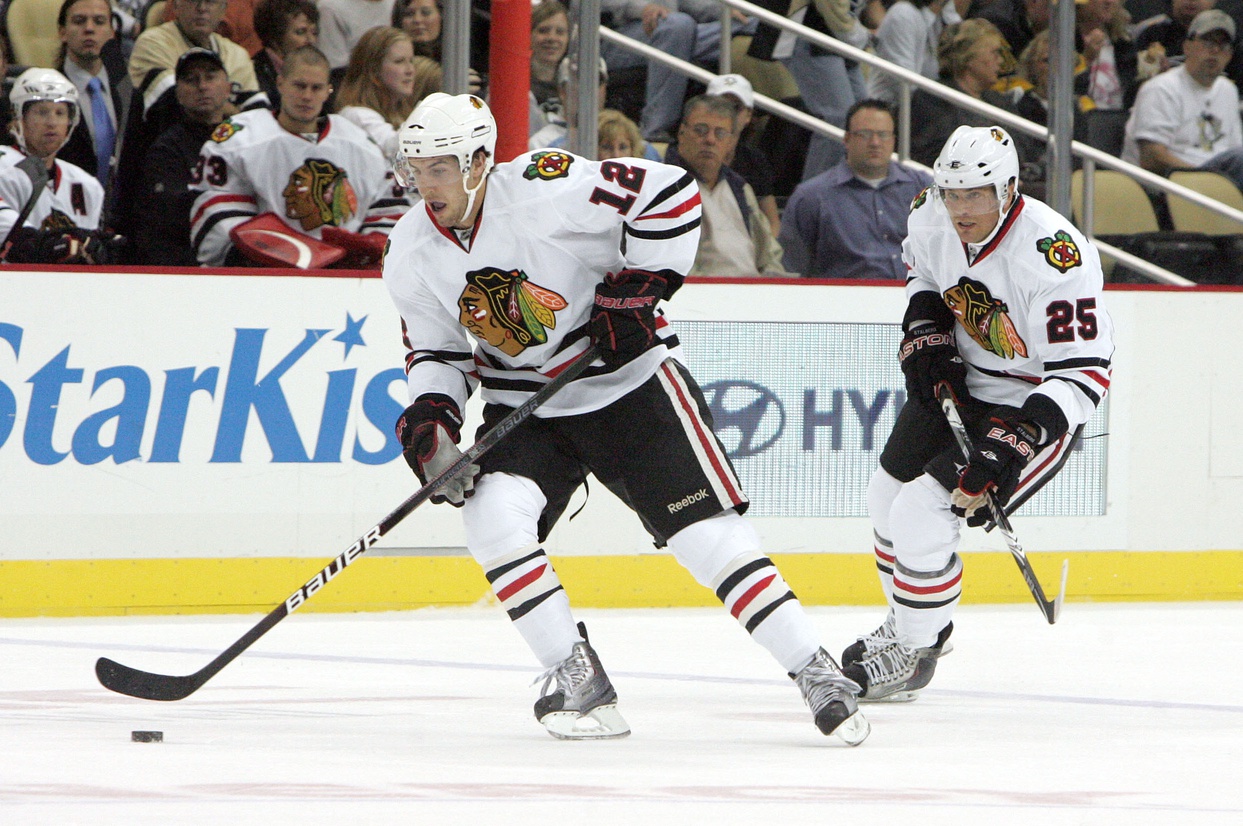 Kyle Beach (Left, No. 12), who came forward against Brad Aldrich in 2021, skates in a 2010 exhibition game. Beach claimed he was sexually assaulted by Brad Aldrich a few months before this preseason contest. Photo Credit: USA Today Network - Blackhawks Sued by Second Player for Cover-Up of Alleged Sexual Assault