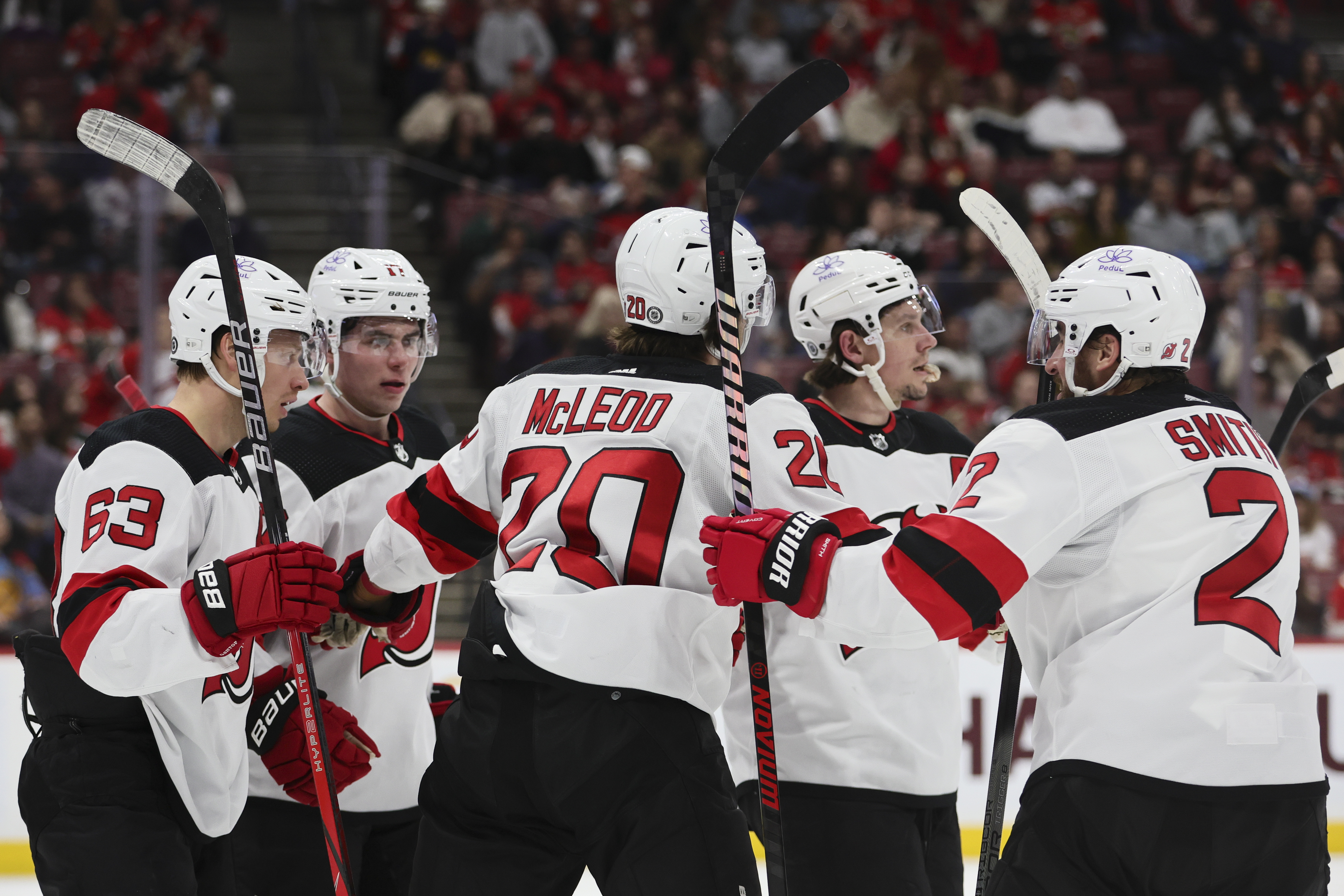 Jan 13, 2024; Sunrise, Florida, USA; New Jersey Devils left wing Jesper Bratt (63) celebrates withteammtes after scoring against the Florida Panthers during the first period at Amerant Bank Arena. Mandatory Credit: Sam Navarro-USA TODAY Sports - Devils' Nico Daws Leads His Team to 4-1 Victory Over Panthers