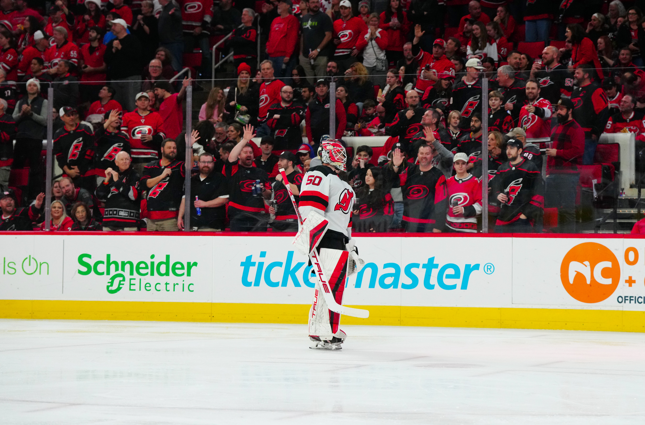 Jan 25, 2024; Raleigh, North Carolina, USA; New Jersey Devils goaltender Nico Daws (50) leaves the ice in the second period against the Carolina Hurricanes at PNC Arena. Mandatory Credit: James Guillory-USA TODAY Sports - 1-on-1 With Devils’ Nico Daws: Departures and New Faces in the Locker Room