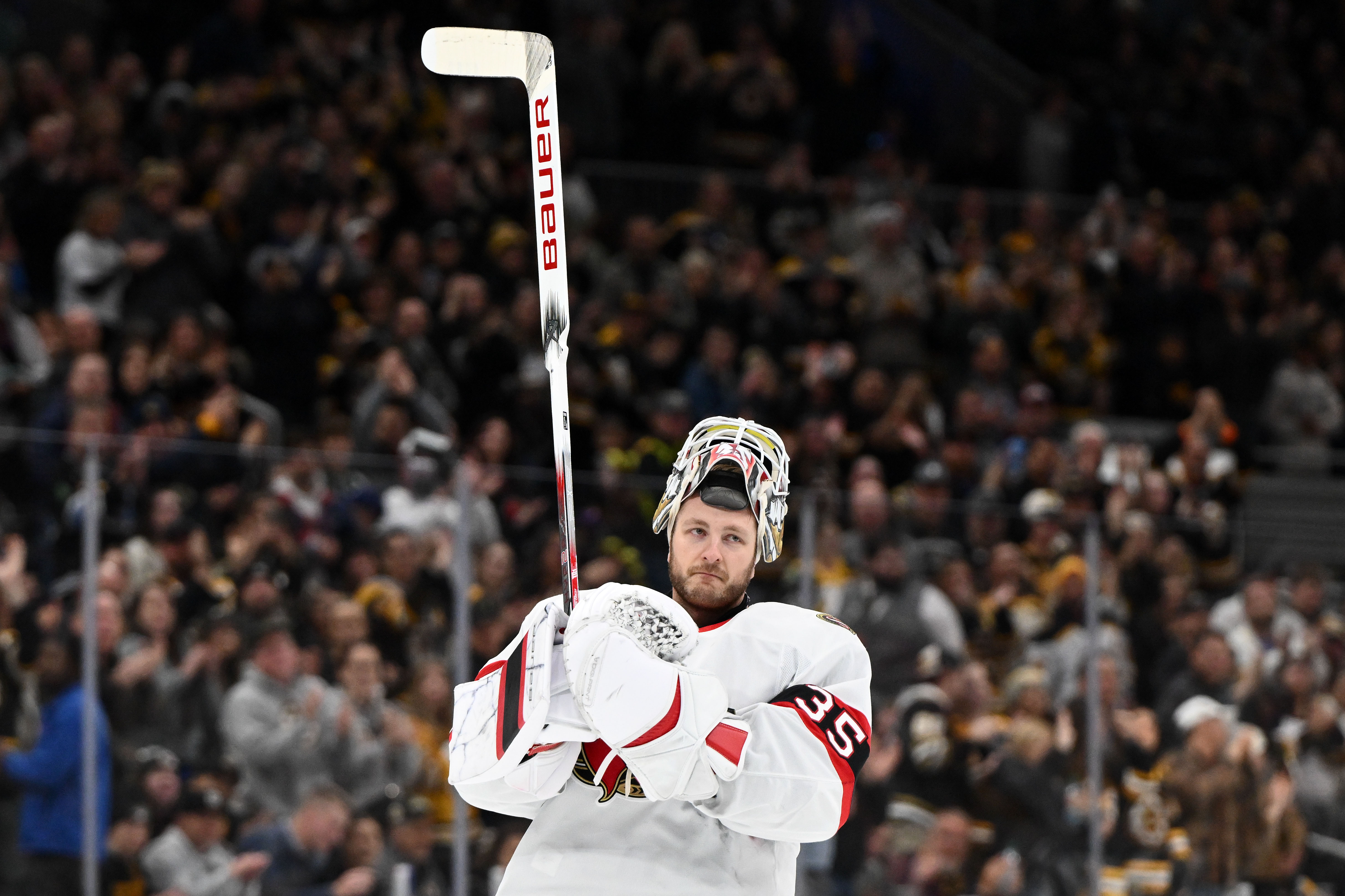 Nov 9, 2024; Boston, Massachusetts, USA; Ottawa Senators goaltender Linus Ullmark (35) reacts after the Boston Bruins played a video marking his return to Boston in the first period at TD Garden. Mandatory Credit: Brian Fluharty-Imagn Images - Ottawa Senators Goalie Linus Ullmark Gets A Standing Ovation (And A Victory) In His Return To Boston