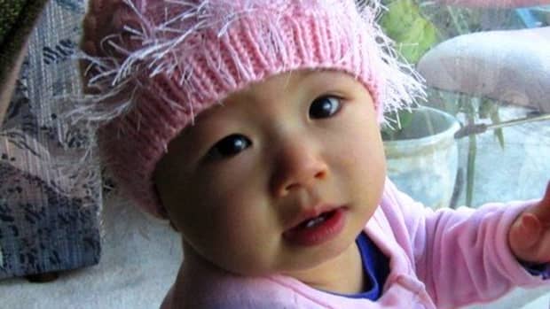 how-to-knit-a-baby-hat-with-double-pointed-needles-pink-cabled-baby-hat-free-knitting-pattern