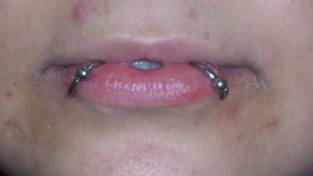 snake-bites-piercing-risks-aftercare-jewelry