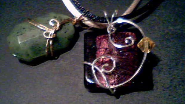 Dichroic glass with swarovski crystal in sterling silver, and faceted jade pendant in 14k gold