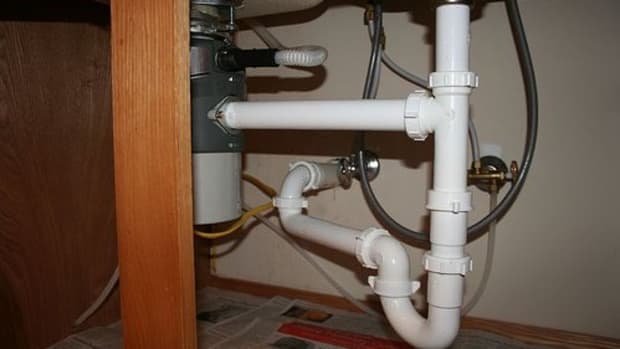 Pipes Under the Kitchen Sink (Photo courtesy by scttrknndy from Flickr)