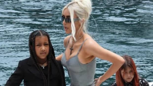 with-north-west-in-italy-kim-kardashian-updates-her-boating-style-with-a-90s-bustier-slacks-and-clear-heels