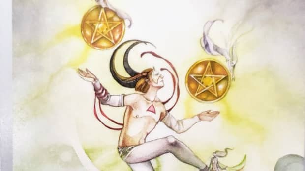 the-two-of-pentacles-in-tarot-and-how-to-read-it