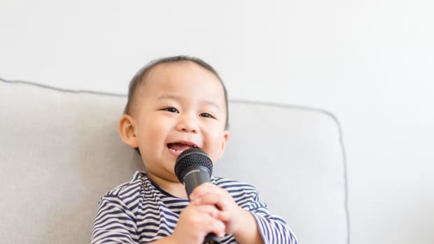 little boy singing