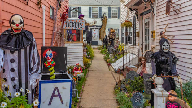 An alley in Salem, Massachusetts covered in spooky Halloween decorations.