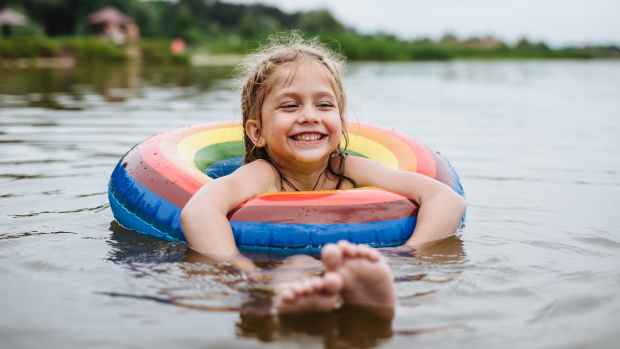 girl floating in river