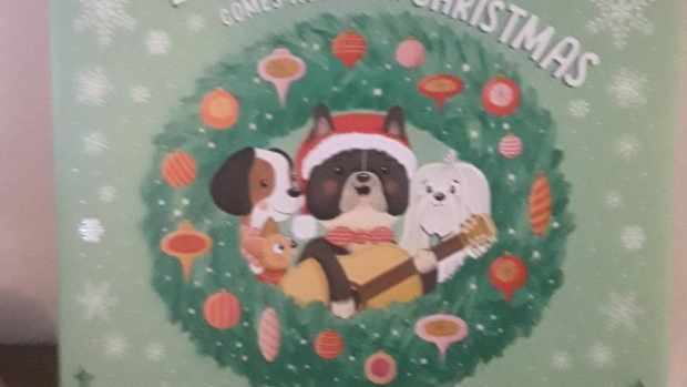 home-for-christmas-with-special-pup-in-dolly-partons-new-picture-book-for-the-holidays