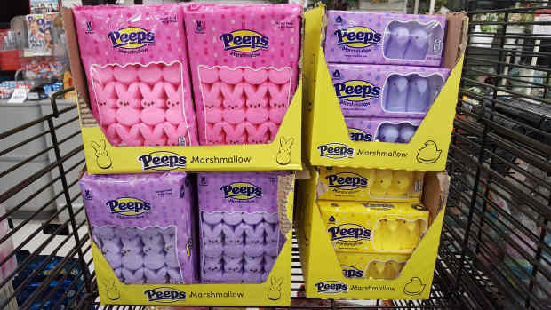 Pink, purple and yellow marshmallow candies for the Easter holiday marketed under the brand Peeps crowd shelves