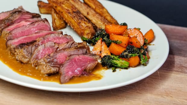 Steak, carrots, broccoli, and potato wedges