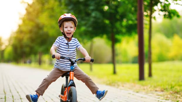 toddler boy riding bike