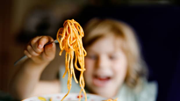 Child eating spaghetti