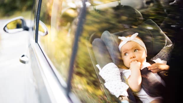 infant riding in car