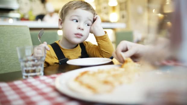little boy at a restaurant