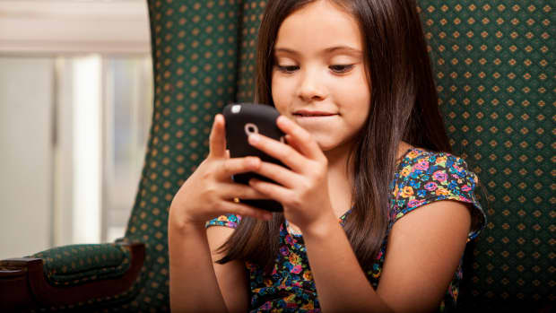 little girl texting