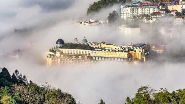 The Hotel de la Coupole in Sapa, Vietnam shrouded in clouds
