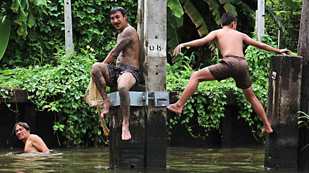 Photo Essay of Bangkok Life: People at Work, Rest and Play - WanderWisdom