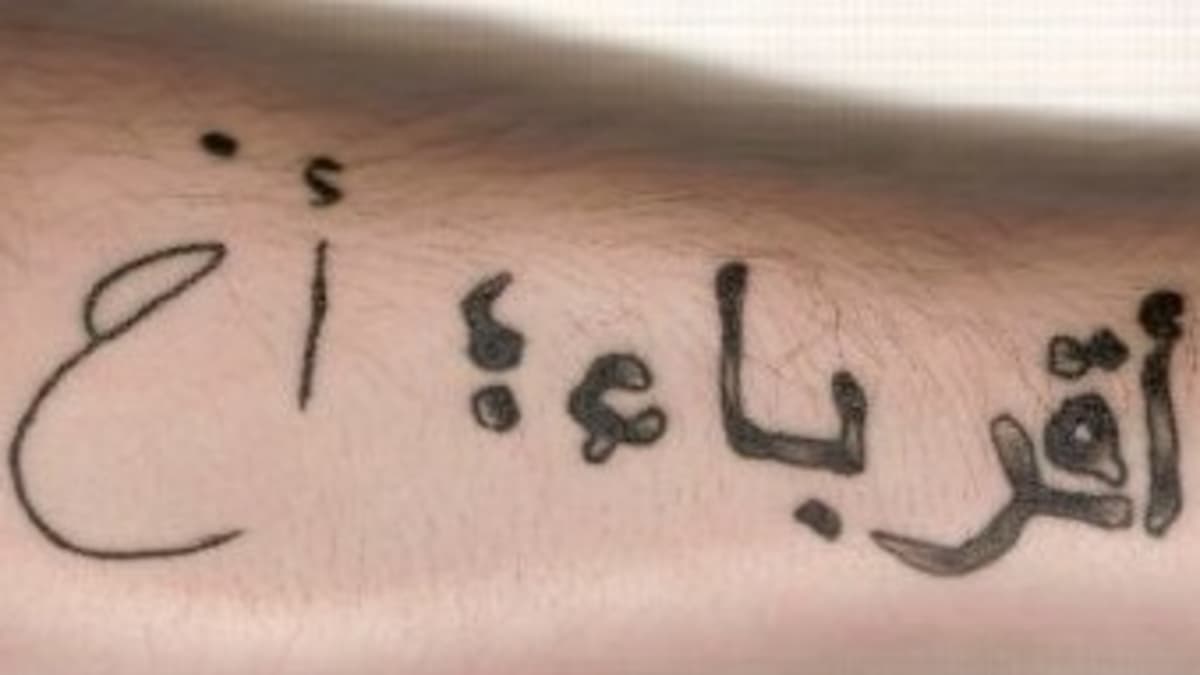 Extreme Good Arabic Words Tattoo On Neck Back – Truetattoos