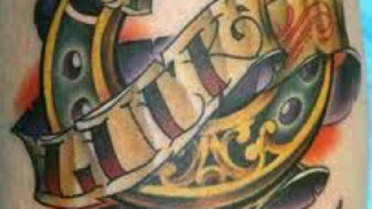 Fine line style horseshoe tattoo on the left inner