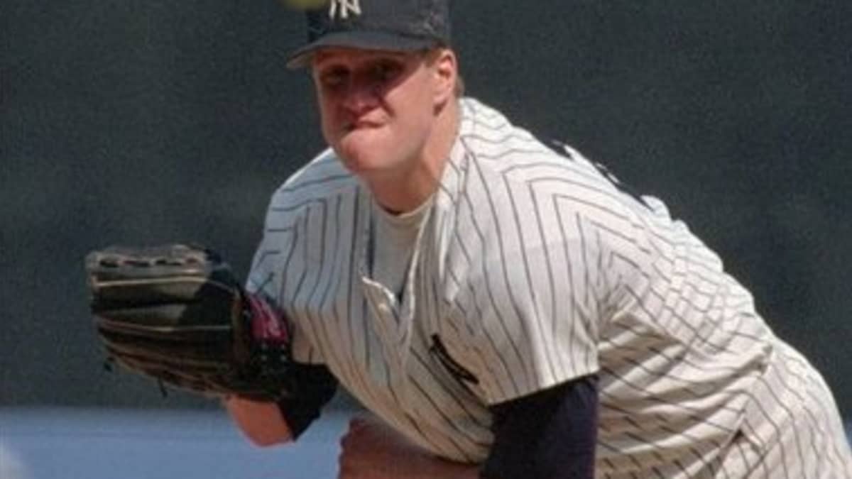 One-handed pitcher Jim Abbott pitching for his high school team in 1985 : r/ baseball