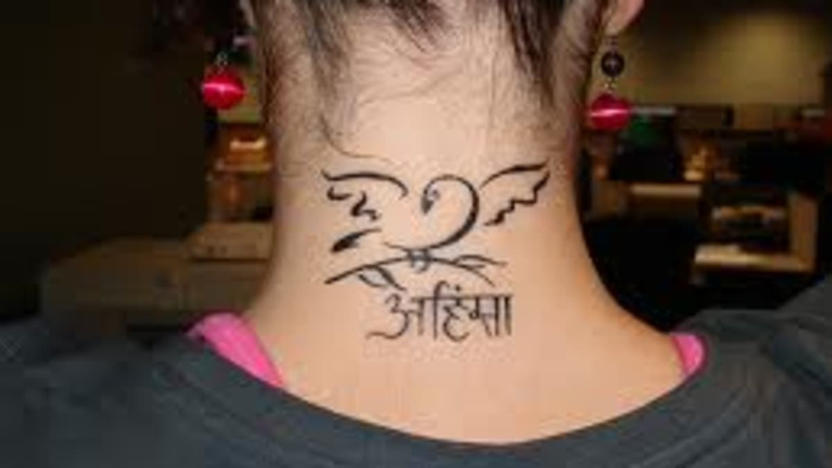Awesome Jain Om Symbol Tattoo On Hand