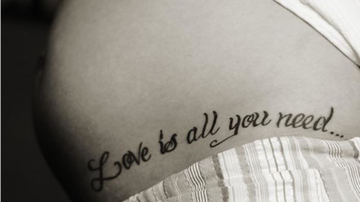All You Need Is Love Tattoo but with a heart instead of a dove  Tatuajes