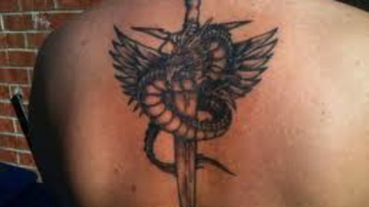 Dragon sword spine tattoo client  Harvest Moon Ink  Facebook