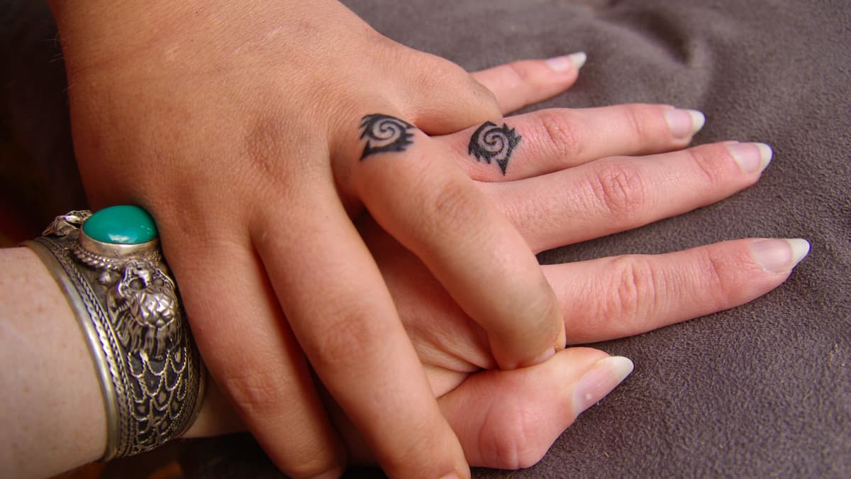 10 Great Wedding and Engagement Ring Tattoo Ideas  TatRing