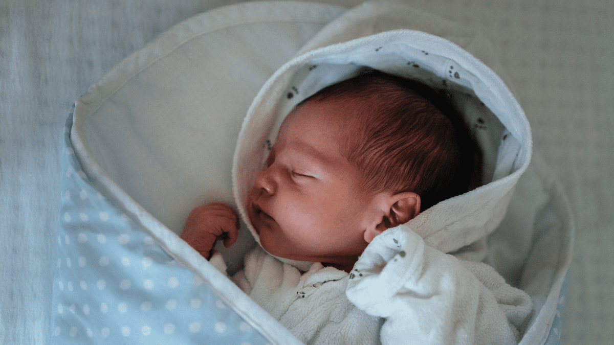newborn baby sleeping in hospital