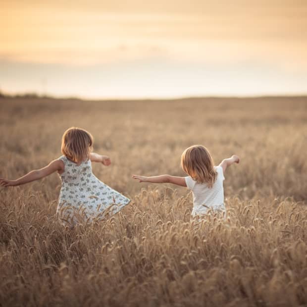 little girls in the field