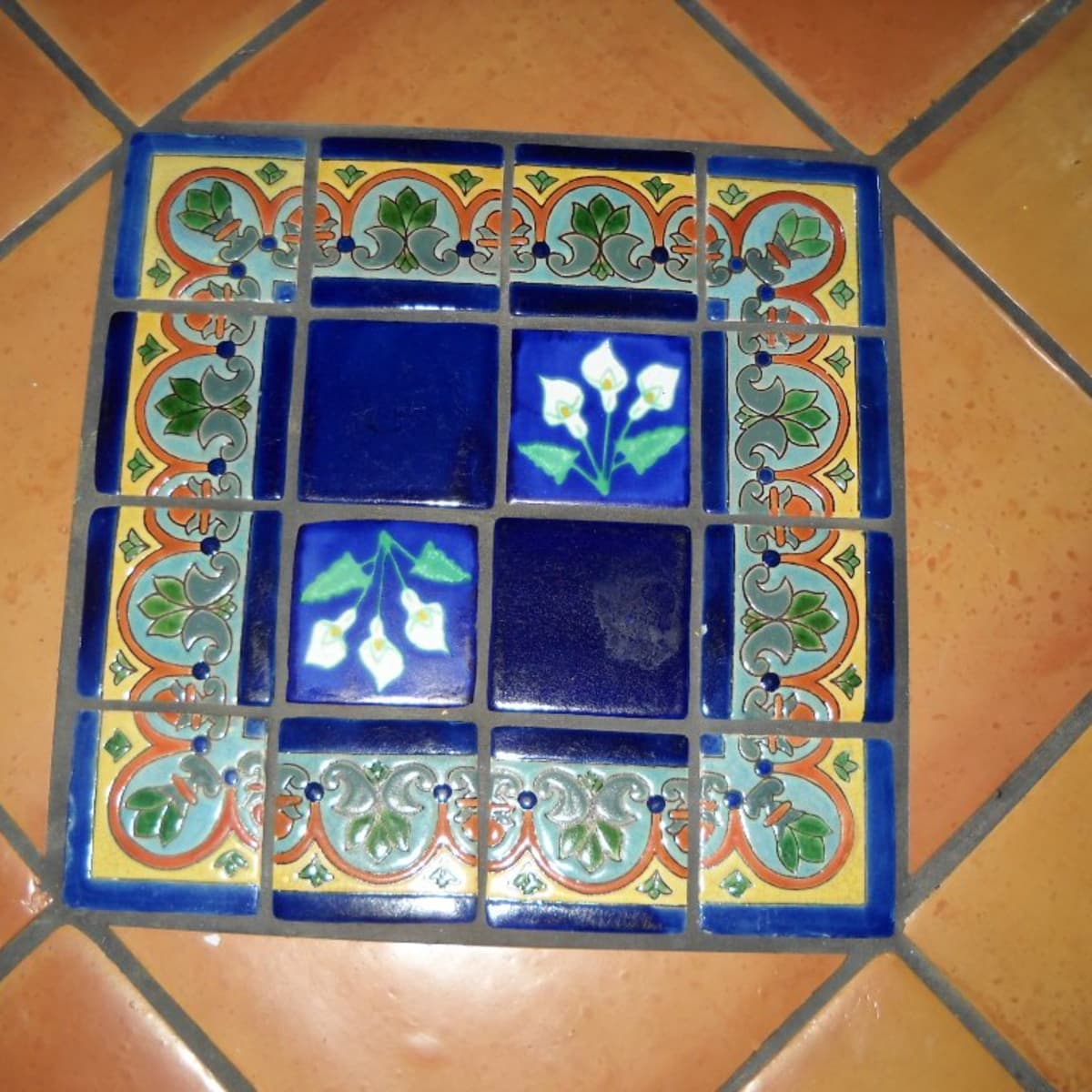 Colourful Mexican tiles kitchen flooring